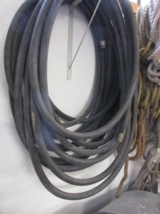 lot 255 image: LONG LENGTH OF BLACK HOSE