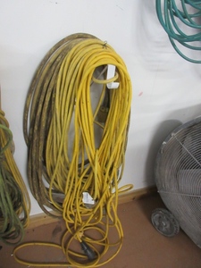 lot 261 image: LONG LENGTHS OF  YELLOW EXTENSION CORDS