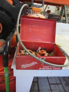 lot 277 image: 2 GALLON SPRAYER AND A BOX OF CLEVISES