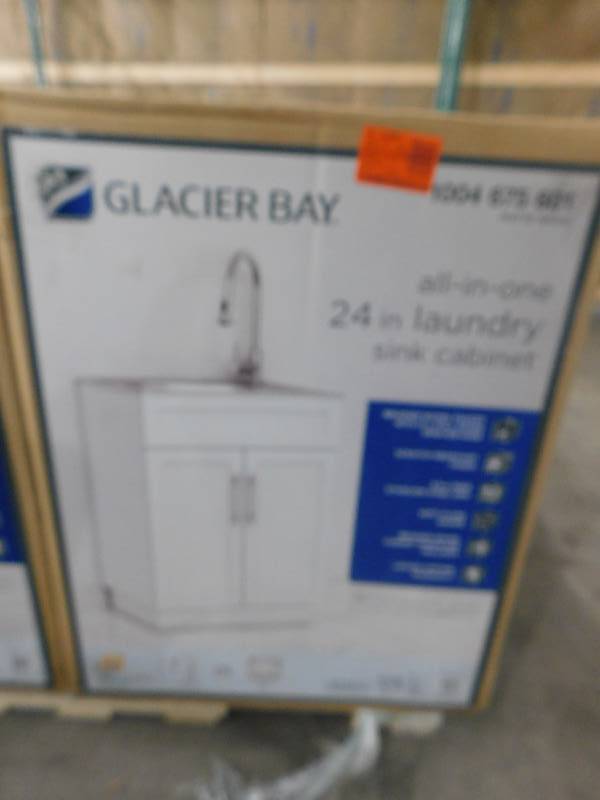 lot 74 image: Glacier Bay All-in-One Stainless Steel 24 in Laundry Sink with Faucet and Storage Cabinet in White