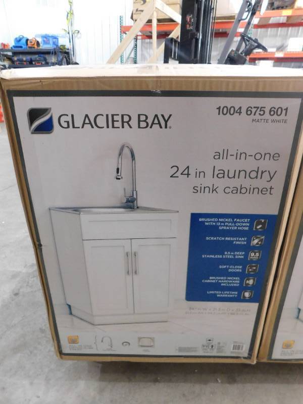 lot 75 image: Glacier Bay All-in-One Stainless Steel 24 in Laundry Sink with Faucet and Storage Cabinet in White