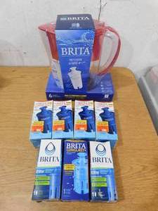 lot 119 image: Brita Small Space Saver Water Pitcher with Filter - 6 Cup - BPA Free - Red With 7 extra filters