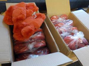 12 Pair of New Slippers size M...