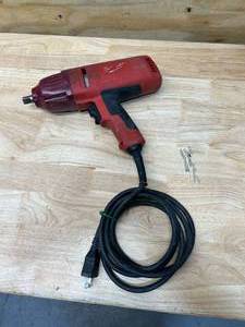 lot 31 image: MILWAUKEE 12 in. Impact Wrench with Rocker Switch and Detent Pin Socket Retention