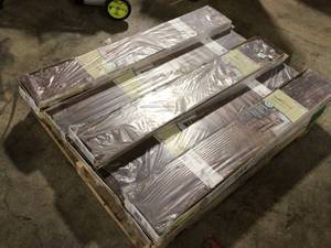 TrafficMaster  Hand scraped Saratoga Hickory 7 mm Thick x 7-23 in. Wide x 50-58 in. Length Laminate Flooring (24.17 sq. ft.  case) lot of 8 cases customer returns