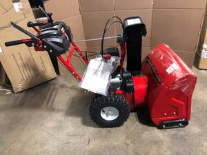 lot 15 image: Troy Bilt Storm 26 in.  Two- Stage Gas Snow Blower with Electric Start Self Propelled cusomer return see pictures
