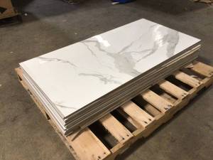 lot 6 image: Pallet with 16 pieces MSI  Ader Tegel White 24 in. x 48 in. Polished Porcelain Floor and Wall Tile (16 sq. ft.Case)