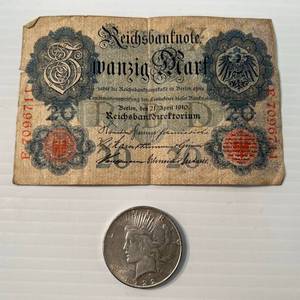 lot 4 image: 1922 D Liberty Peace Dollar In Protective Case & 1910 German 20 Note