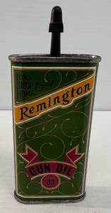 lot 21 image: Antique Remington Gun Oil Can (Full)