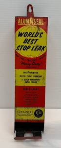 lot 44 image: Antique AlumAseal Worlds Best Stop Leak Metal Advertisment Piece (VERY COOL)