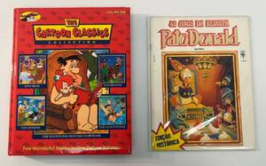 lot 102 image: Vintage Cartoon Classics Collection Book And Spanish Version Walt Disney Donald Duck Comic Book