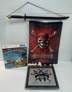 lot 103 image: Group Of Misc. Pirates Of The Caribbean Items And Pickel The Pirate Game NIB