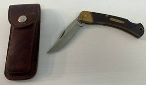 lot 106 image: Vintage Schrade Pocket Knife With Leather Sheath