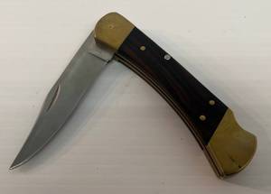 lot 107 image: Vintage Buck 110 Pocket Knife