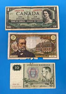 lot 129 image: Three Misc. Foreign Currencies 1 France 1 Sweden 1 Canadian 1954 (Has Writing And Mustache