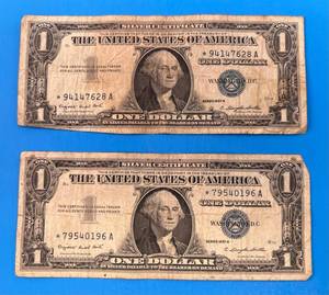 lot 130 image: Two United States 1957 A One Dollar STAR Silver Certificates