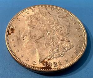 lot 134 image: 1921 Morgan Silver Dollar No Mint Mark In Plastic Protector