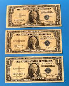 lot 137 image: Three 1935 United States One Dollar Silver Certificates 1D, 2F