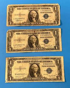 lot 143 image: Three 1935 United States One Dollar Silver Certificates 1 C, 1 D, 1G