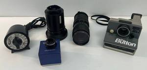 lot 233 image: Group Of Vintage Camera Items Including Polaroid The Button Camera, Vintage Exposure Timer, Vivitar 75-200MM 138 Lense, Computar 116105-150 Lens And More