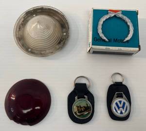 lot 243 image: Group Of Vintage Automobile Parts Including VW Leather Key Chain And More