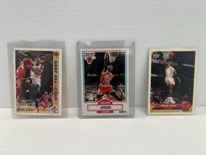 lot 273 image: Three Vintage Michael Jordan Cards Including 1991,1993 Upper Deck And 1990 Fleer In Protective Sleeves