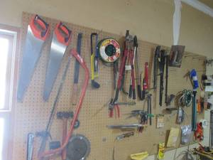 lot 28 image: All tools and hardware on garage pe...
