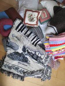 lot 62 image: Large stack of pillows, assorted ru...