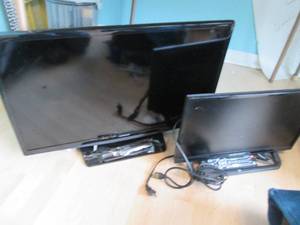 lot 79 image: Samsung 28 flat-screen TV along wi...