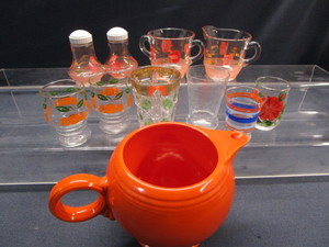 lot 122 image: Fiesta Pitcher, Juice Glasses, CreamSugar