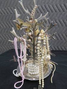 lot 29 image: NECKLACE TREE STAND WITH  VINTAGE NECKLACES, EARRINGS, BRACELETS