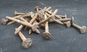 lot 75 image: VINTAGE RAILROAD NAILS
