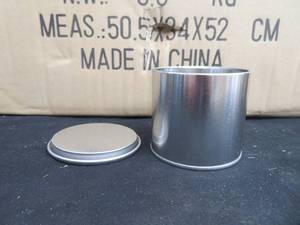 lot 94 image: CASE OF NEW SMALL TIN CANS WITH LIDS