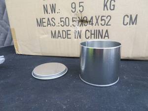 lot 95 image: CASE OF NEW SMALL TIN CANS WITH LIDS