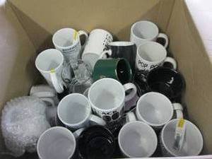 box of coffee cups with different s...