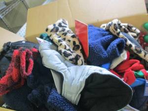big box of overstock dog clothes an...