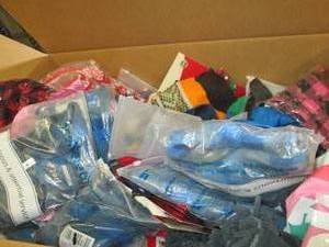 big box of overstock dog clothes an...