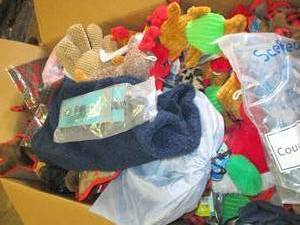 big box of dog clothes and toys ove...
