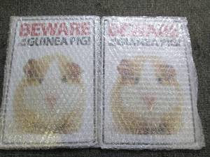 2 metal beware of the guinea pig si...