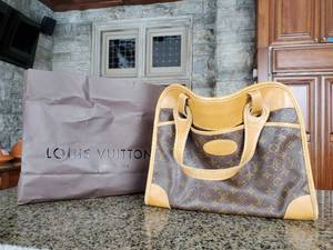 lot 359 image: Vintage Luis Vuitton Diaper Bag