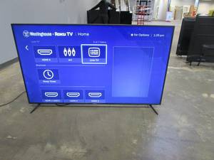 lot 903 image: Westinghouse 65 4K Ultra HD Roku Smart TV WR65UT4212 (LINE, SEE PHOTOS)