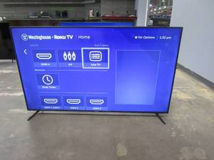 lot 904 image: Westinghouse 65 4K Ultra HD Roku Smart TV WR65UT4212 (SCRATCHES ON SCREEN)