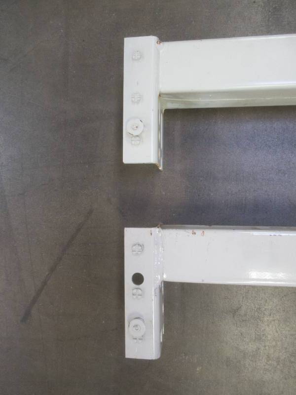 lot 809 image: (2) Teardrop Steel Racking Beams in White. Dimensions 96 x 2 12.  Used in Warehouse, In nice condition. SOLD AS IS.