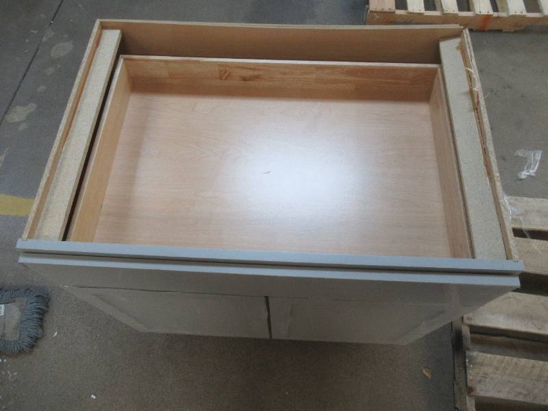 lot 266 image: Hampton Bay Courtland Shaker Assembled 36 in. x 34.5 in. x 24 in. Stock Base Kitchen Cabinet in Sterling Gray Finish (SLIGHT DAMAGE ON THE BACK RIGHT SIDE, SCRATCHES ON THE FRONT, SEE PHOTOS)