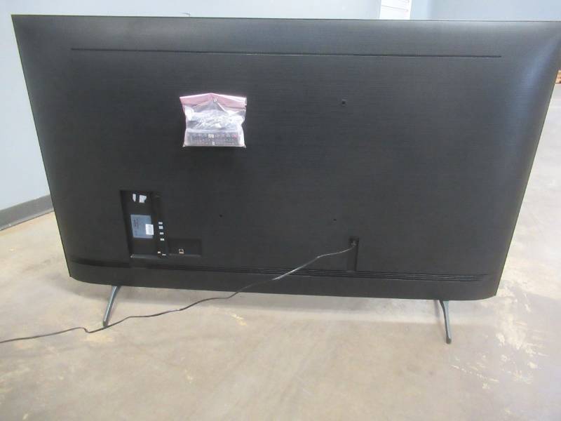 lot 30 image: SAMSUNG UN75TU7000 75 inches 4K Ultra HD Smart LED TV (SHADE SPOTS AT BOTTOM, SEE PHOTOS)