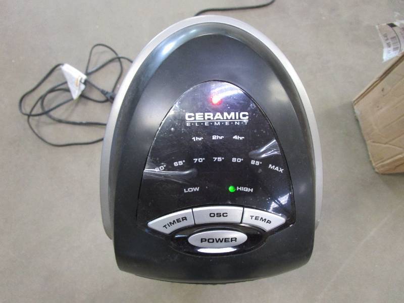 lot 290 image: Lasko Oscillating Ceramic Tower Space Heater for Home with Adjustable Thermostat, Timer and Remote Control, 22.5 Inches, GreyBlack, 1500W, 751320 (SMALL CHIP ON BOTTOM BASE)