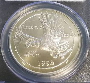 lot 04 image: 1994-W US SILVER DOLLAR POW COMMEMORATIVE MS69 PCGS