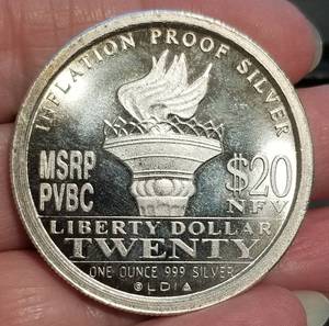 lot 66 image: 2009 NORFED $20 1 TROY OZ .999 FINE SILVER PREVIOUSLY BANNED ROUND