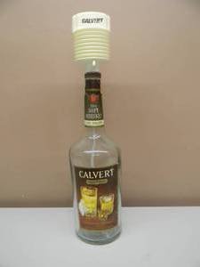 lot 35 image: Calvert Extra One Gallon The Soft Whiskey Bottle With Calvert Pump - Man Cave Bar Display - VERY COOL PIECE - APPROX 25 - SEE PICTURES