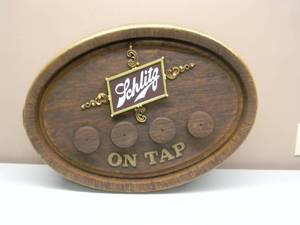 lot 39 image: VERY RARE - VINTAGE SCHLITZ BEER FOUR TAP OVAL BARREL MOUNTING KIT - NEW OLD STOCK - FANTASTIC PIECE - APPROX 25 By 18 - SEE PICTURES